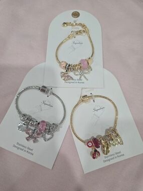 3 Signature Women's Gold and Silver Charm Bracelet Set with Pink Accents